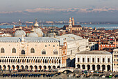 Aerial view of venice with Campanile di San marco, snow-capped mountains of the Alps in the background, Venice, Veneto, Italy