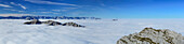 Panorama from Guffert with view across a sea of fog towards the Stubai range, Unnuetz in the foreground, Karwendel range, Wetterstein range with Zugspitze and western summit of Guffert, Guffert, Rofan range, Tyrol, Austria