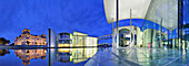 Panorama with German Reichstag, Paul Loebe-Haus and Marie-Elisabeth Lueders-Haus along the river Spree, illuminated, architect Stephan Braunfels, Berlin, Germany