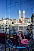 Christian Louboutin shop window, Reflection of the Grossmunster church in the window, Zurich, Switzerland