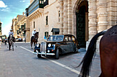 Limousine in front of the government building, Valletta, Malta