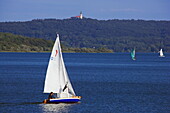 Sailing boat and Andechs monastery in the background, Ammersee, Upper Bavaria, Bavaria, Germany