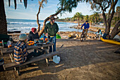A group of young adults camping at El Capitan State Beach Goleta, California, USA