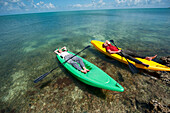 A man and woman nap in their kayaks near Key West, Florida Key West, Florida, USA