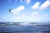 Kitesurfer changes direction on his board Cardiff-by-the-sea, California, USA