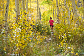Female running in the mountains, Provo, Utah.++, Provo, Utah, United States