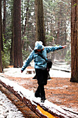 A woman walks through Yosemite National Park, California Yosemite, California, United States of America