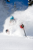 A man skiing some deep powder at Snowbird Utah Utah, USA