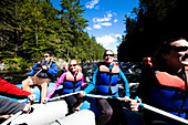 A group of adults whitewater rafting in Maine West Forks, Maine, United States of America