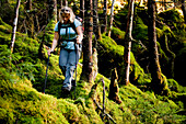 An athletic female hiker hikes the Franconia Ridge Trail Franconia, New Hampshire, United States of America