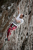 A man with white t shirt and red pants climbing in Jilotepec, Estado de Mexico, Mexico Not applicable, Estado de Mexico, Mexico