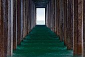 An abstract view from underneath Scripps Pier in La Jolla, California La Jolla, California, USA