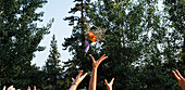Ladies' hands reach for the bouquet in South Lake Tahoe, California Lake Tahoe, California, USA