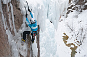 Woman ice and rock climbing, Ouray, Colorado Ouray, Colorado, USA