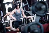 Two young women weight train together Birmingham, Alabama, United States