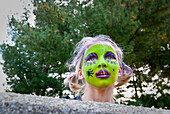 young girl with face paint, portland, me, usa