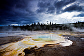 Chromatic Spring on a stormy day in Yellowstone National Park, Wyoming Yellowstone National Park, Wyoming, USA