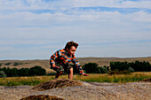 Child playing in the summer outdoors, MT, USA
