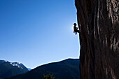 A athletic man rock climbing in Montana., Bozeman, Montana, USA