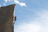 A man climbing a rock arete in  Rocky Mountain National Park, Estes Park, Colorado., Estes Park, Colorado, usa