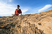 Yoga on volcanic tablelands Bishop, California, United States