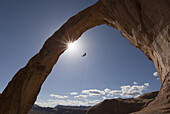 Man rappels off arch in Moab Moab, Utah, United States