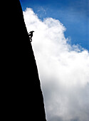 Climber on a rock in Sardinia, Italy, Sardinia, Italy