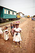 Children beside railroad tracks, between Ouidah and Cotonou, Benin