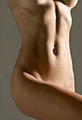 Close up of nude Hispanic woman's torso, Caracas, Venezuela