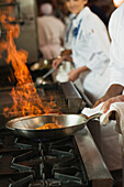 Food flaming in pan, Orlando, FL