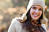 Smiling mixed race woman in cap, Seattle, WA, USA