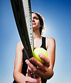 Caucasian woman playing tennis, Lehi, Utah, USA