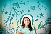 Mixed race girl with space doodles surrounding head, Jersey City, New Jersey, USA
