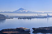 Winter smog rising over the industrial area of Tacoma, Tacoma, Washington, USA