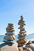 Small tapering pillars of rocks placed one on top of the other, Greymouth, South Island, New Zealand