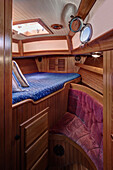 Sleeper in boat cabin, Seattle, Washington, USA