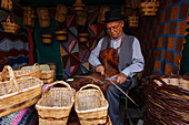 basket maker at a market stand, festival of almond blossom, Fiesta del Almendrero en Flor, Valsequillo, near Telde, Gran Canaria, Canary Islands, Spain, Europe