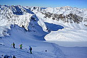 Back-country skier downhill skiing from Kuhscheibe, Stubai Alps, Tyrol, Austria