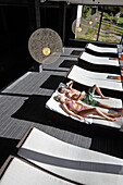 Guests relaxing in the spa area of a hotel, Adelboden, Canton of Bern, Switzerland