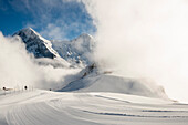 Skigebiet am Männlichen, dahinter Eiger Mönch und Jungfrau, Grindelwald, Kanton Bern, Schweiz