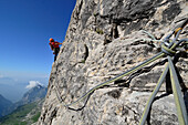 Climber ascending Soddisfazione, Cima d Ambiez, Brenta Dolomites, Trentino, Italy