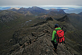 Hiker descending from Sgurr nan Gillean, Cuillin, Isle of Skye, Scotland, Great Britain