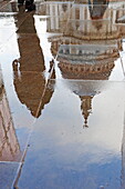 Reflection of St. Paul's cathedral on the pavement on a wet day, City, London, England, United Kingdom