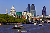View over the Thames to St. Paul's Cathedral and the office highrisers of the City, London, England, United Kingdom