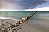 Groynes on the beach in the evening, Darss, Baltic Sea, Mecklenburg-Vorpommern, Germany