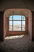View from the architect's house, interior of the deserted ghost town in the Diamond restricted area, Kolmanskop near Luderitz, Namibia, Africa
