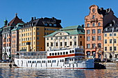 Excursion boat at Skeppsholm quay of Gamla Stan, Stockholm, Sweden