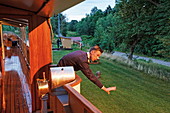 Captain of the historic river boat Juno during a difficult manouvre on the Gota canal, Norrkoeping, Sweden