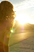 Young woman and sunlight, California, USA