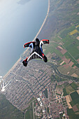 Wingsuit flying over Empuriabrava, Spain